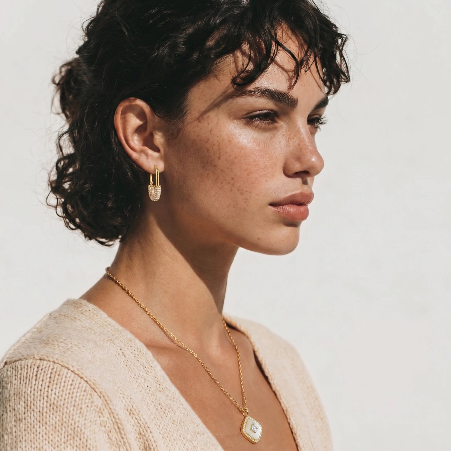 Golden Glow Huggie Hoops | 14 K Gold plated Eco-brass & Zirconia